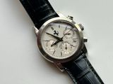 a close up of a wrist watch with a black strap
