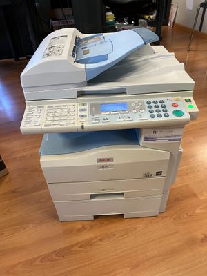 a printer that is sitting on top of a printer