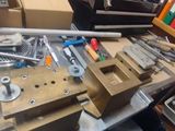 a workbench with a lot of tools on top of it