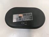 an image of a wireless mouse sitting on top of a table