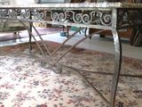 a table that is sitting in the middle of a room