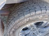 a close up of a tire on a truck