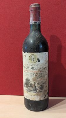 a bottle of wine that is sitting on a table