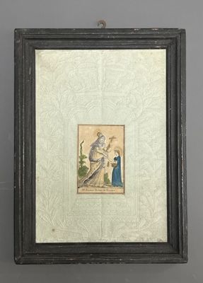 an antique framed picture of a woman and child in a garden