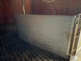 an image of a dirty truck bed in the back of a truck