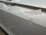 a sticker on the door of a car that says vauto