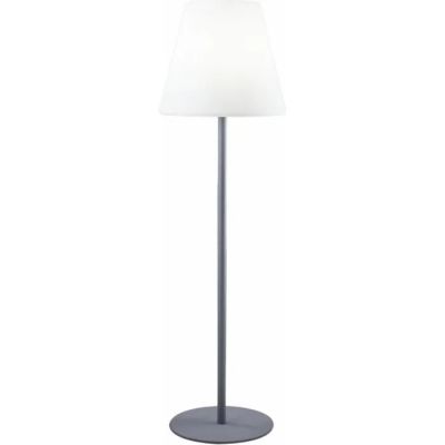 the lamp is on a metal base with a white shade