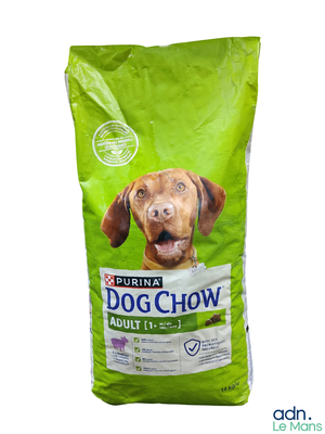 the bag of dog chow is sitting on a white surface
