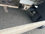 a flat bed trailer with a flat bed attached to it