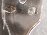 a close up of a fork and a knife on a table