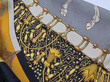 a close up of a neck tie with a design on it