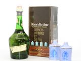a bottle of alcohol next to a box and a canister