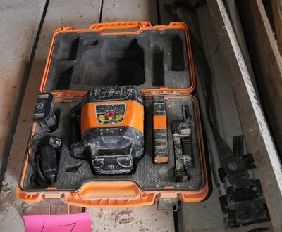 a box with tools on top of it in a room