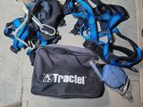 a black bag with blue straps and a black bag with a blue handle
