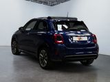the back end of a blue fiat suv parked in a showroom
