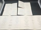 a lot of papers that are in a metal case