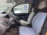 the interior of a car with a steering wheel and a seat in it