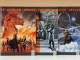 trois livres exposés sur une table