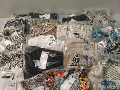 a pile of clothing that is sitting on a table