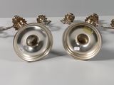 pair of antique silver plated candlesticks with flowers and leaves