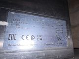 a picture of a metal sign on a wall
