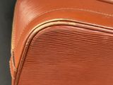 a close up of a piece of luggage on a table