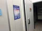 a poster on the door of a public restroom