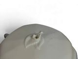 a white and blue bowl with a lid on a table