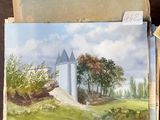 a picture of a painting of a castle on a table