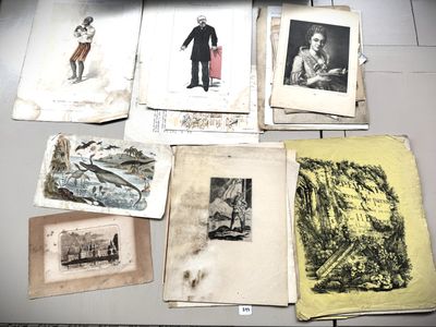 many old photographs on the table with pictures on them