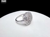 silver plated ring with white topaz and clear topaz surrounded by diamonds