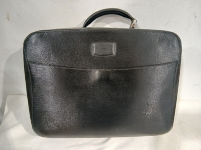 black leather briefcase on white background with white background