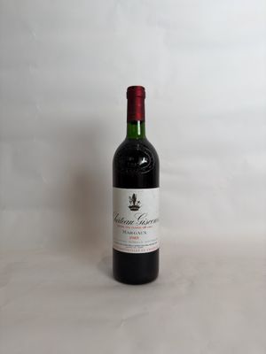 a bottle of wine that is sitting on a table