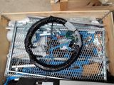 a metal cage with a steering wheel inside of it