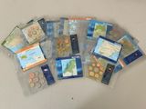 a lot of coins in the bags on the table