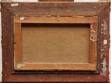 an old wooden picture frame with a piece of brown paper on top of it