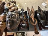 a lot of masks that are sitting on a table