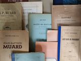many books that are sitting on top of a table