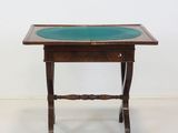 an image of a small table with a glass top on a white floor