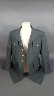 an image of a green military jacket on a mannequin