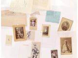 many old photos of men and women on a table