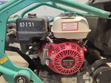 a close up of a small engine on a small machine