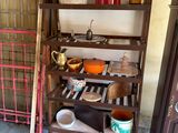 a shelf that has a bunch of items on it