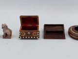 several pieces of wood and metal on a white surface