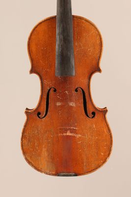 a close up of a violin on a white background