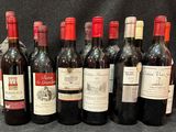 plusieurs bouteilles de vin rouge sont alignées sur une table
