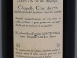 a label on a bottle of wine on a table