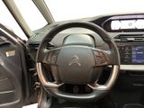 the interior of a car with a steering wheel and dashboard