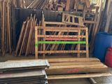 several pieces of wood are stacked on a pallet in a warehouse