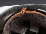 a close up of a metal object with rust on it